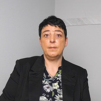 Foto von Manuela Strassen, Geschäftsführerin von Transporte Strassen, im Gespräch über die Arbeitszeiterfassung mit Dajeh